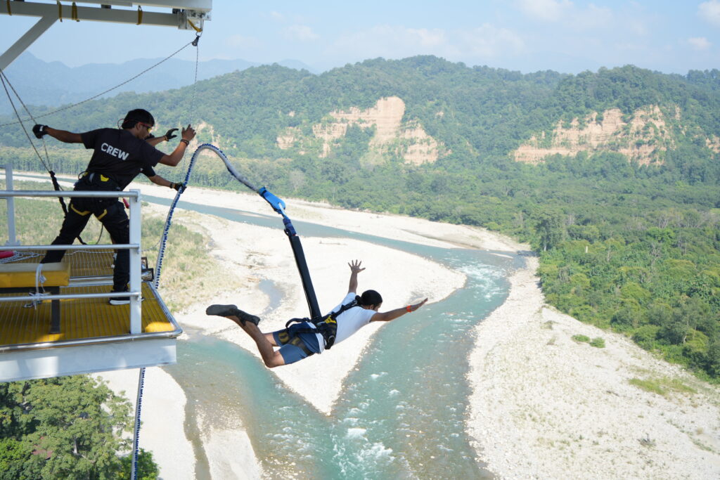 Man performing Highest Bungee Jumping 140m at Jim Corbett adventure site