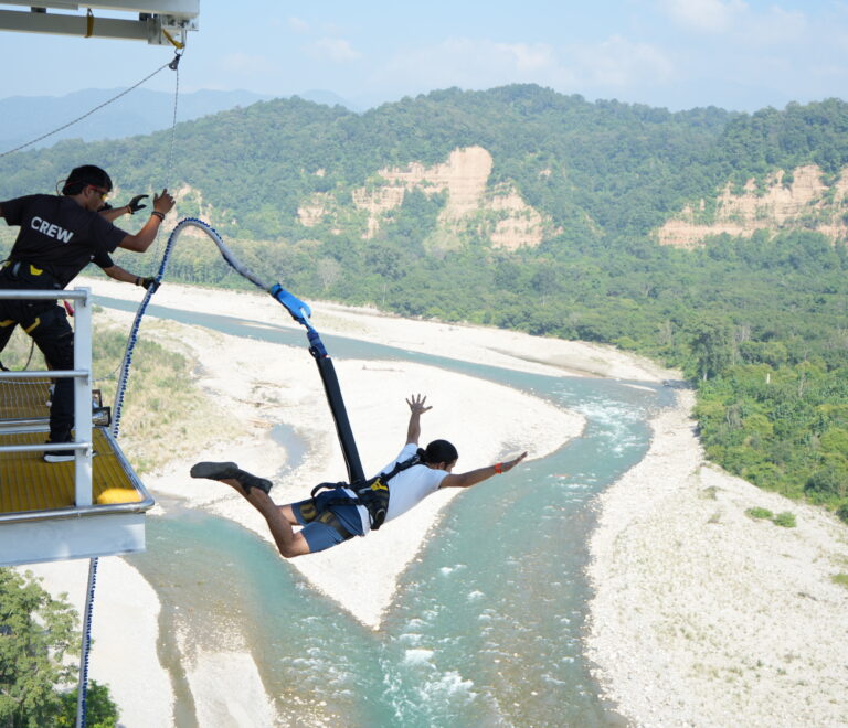 Man performing Highest Bungee Jumping 140m at Jim Corbett adventure site